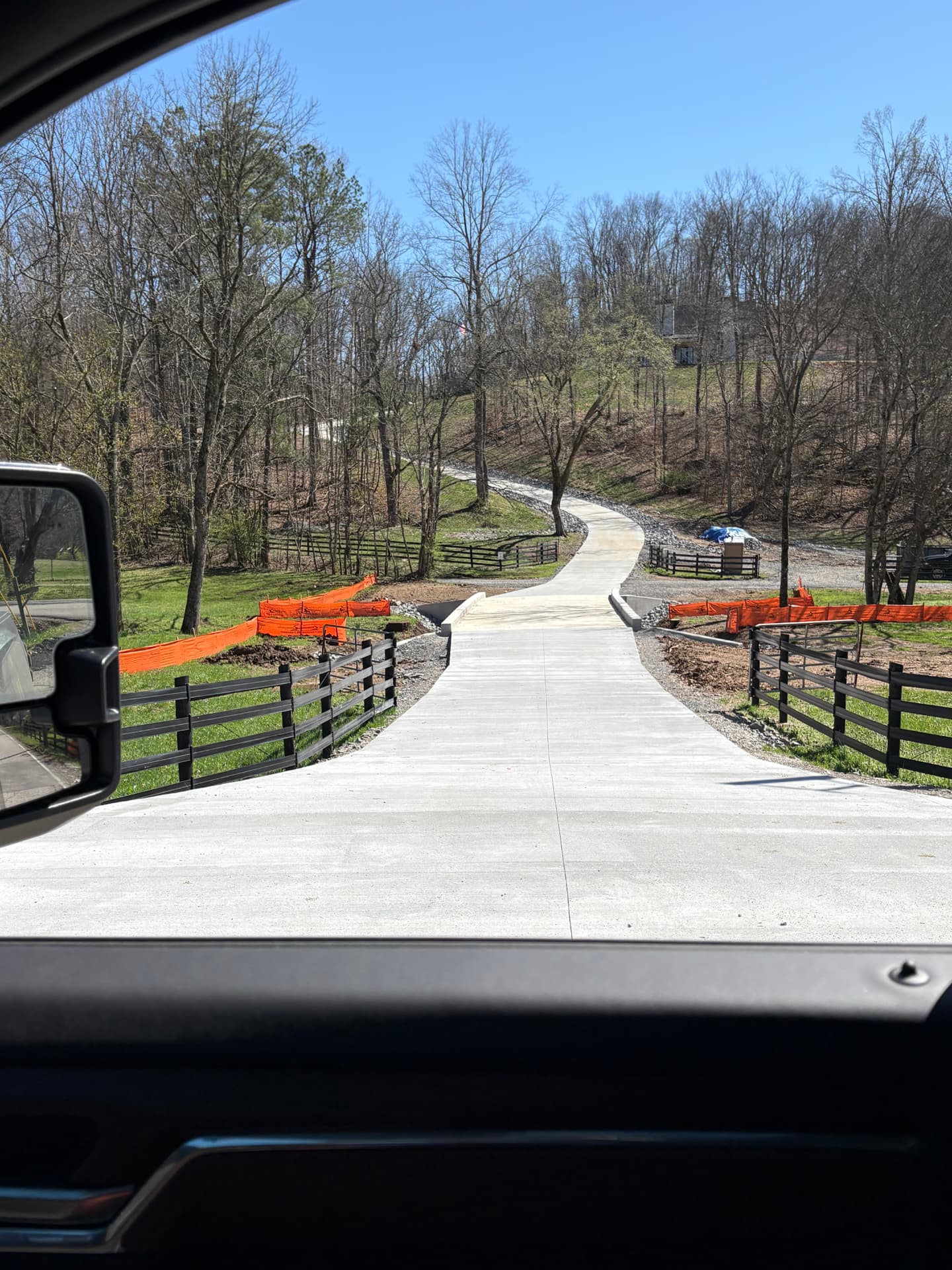Long winding drive with creek crossing — concrete work by Williams Concrete Services in Sumner County, TN